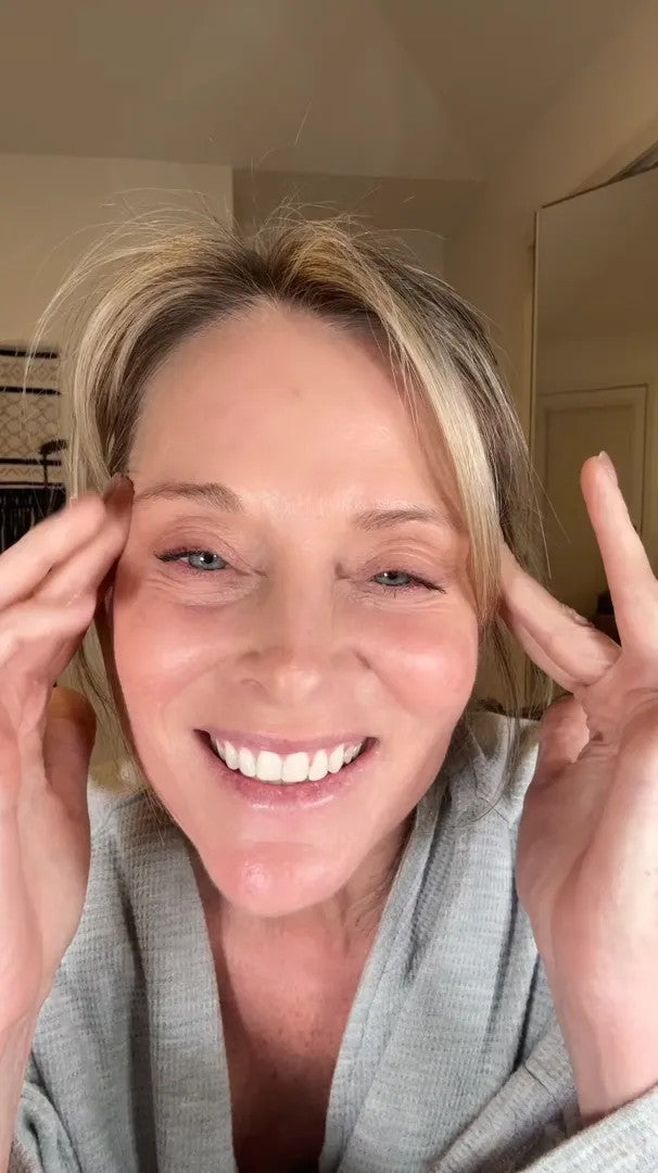 UGC video: blonde woman in a grey robe talking about Korean skincare