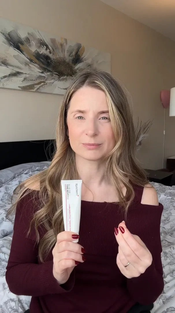 UGC video: woman in burgundy applying the cream